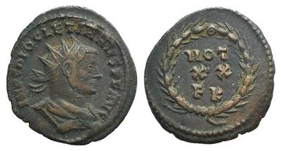Radiado post reforma de Diocleciano. VOT XX  dentro de corona. Cartago. 2355709.m